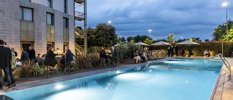 Indoor pool, seasonal outdoor pool, pool umbrellas, pool loungers