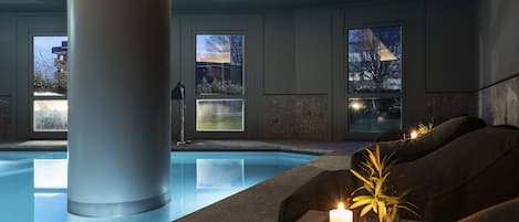 Indoor pool, seasonal outdoor pool, pool umbrellas, pool loungers