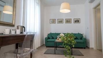 Double Room | Minibar, desk, laptop workspace, iron/ironing board