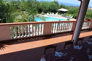Breakfast, dinner served; local cuisine, al fresco dining