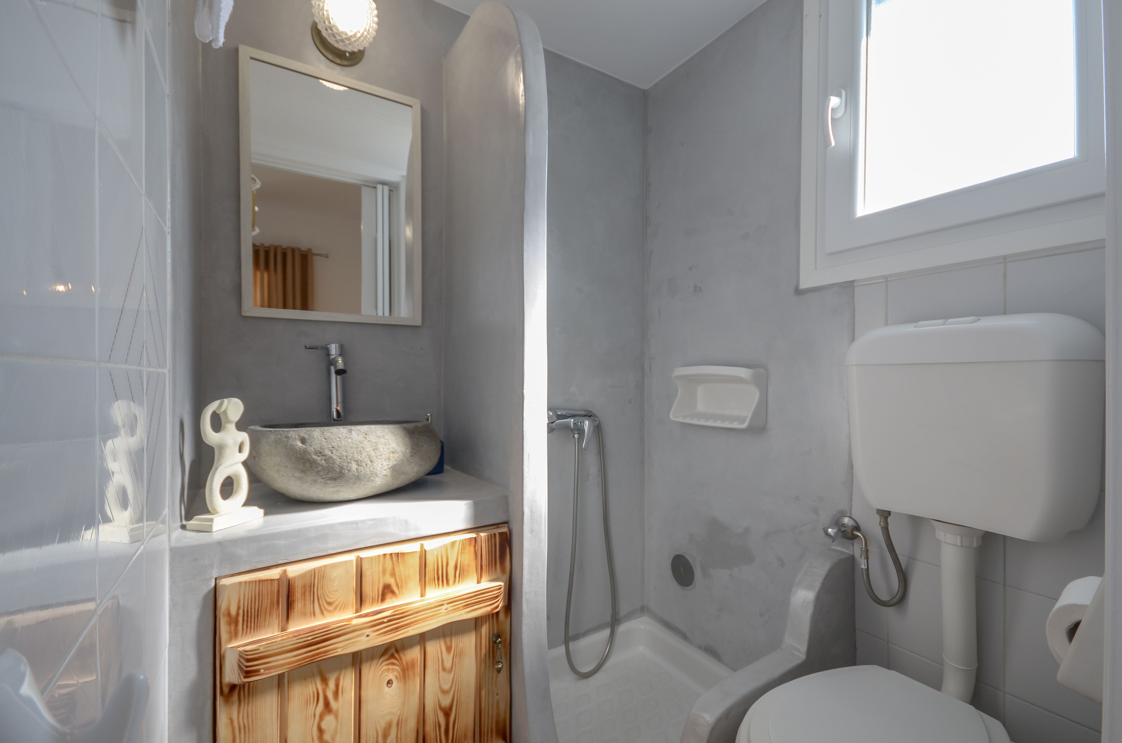 shower, hair dryer, towels, shampoo