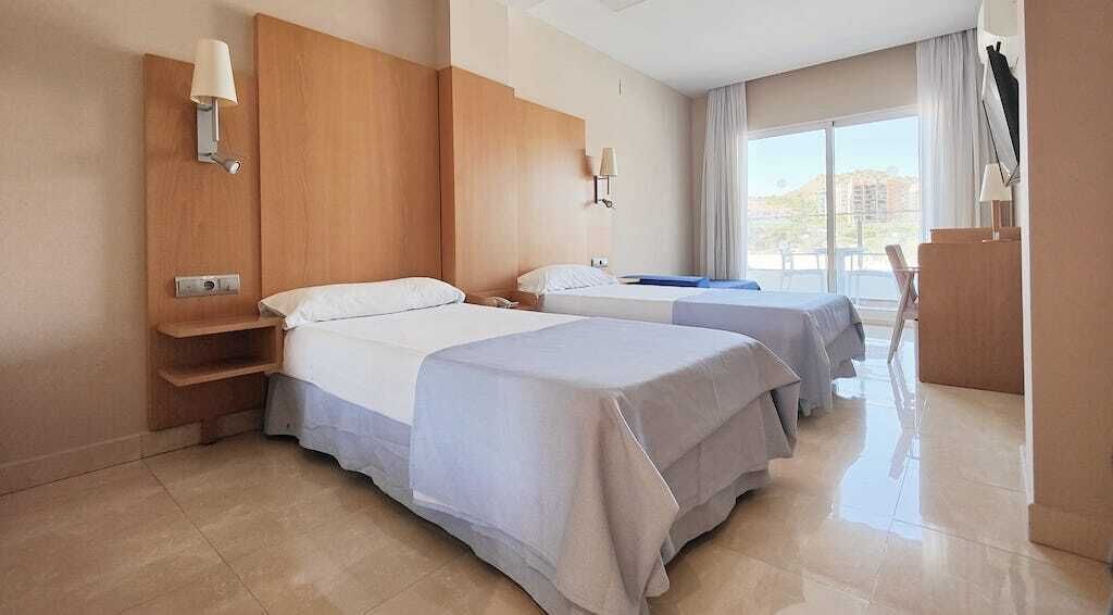 superior room, partial sea view | 1 bedroom, minibar, desk, blackout curtains