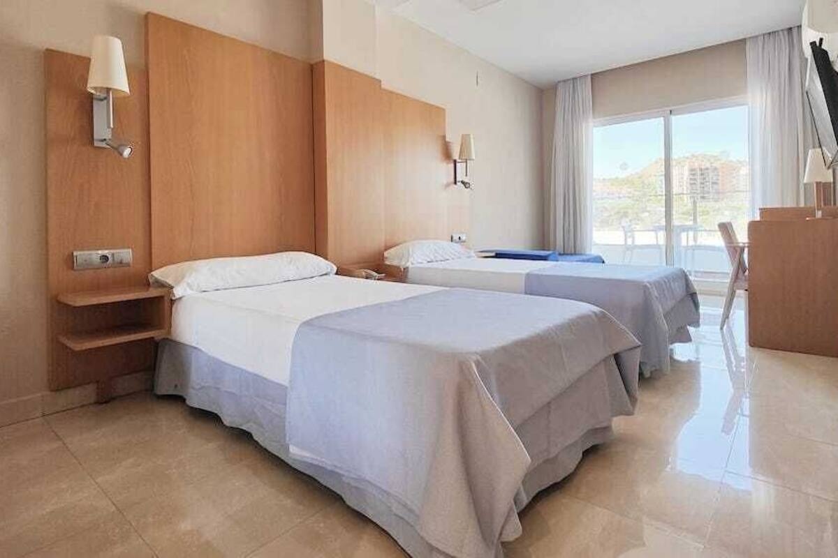 double or twin room, partial sea view | 1 bedroom, minibar, desk, blackout curtains