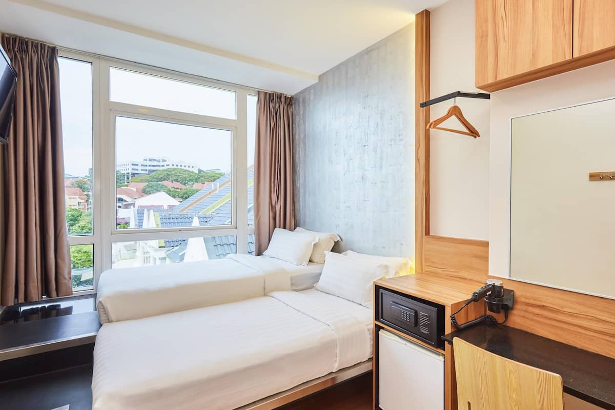 Chambre Deluxe, 2 lits une place | Bureau, fer et planche Ă repasser, Wi-Fi gratuit, draps fournis