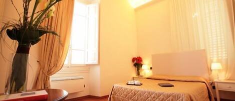 Hypo-allergenic bedding, desk, blackout drapes, iron/ironing board