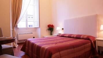 Hypo-allergenic bedding, desk, blackout drapes, iron/ironing board