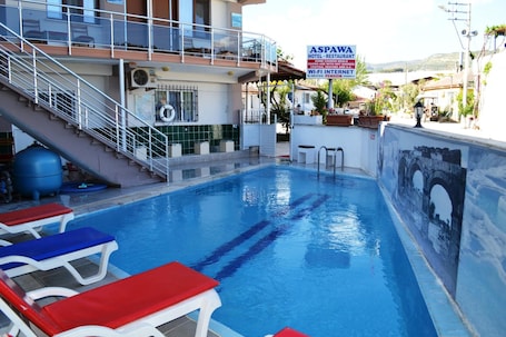 Seasonal outdoor pool, sun loungers. Aspawa Hotel