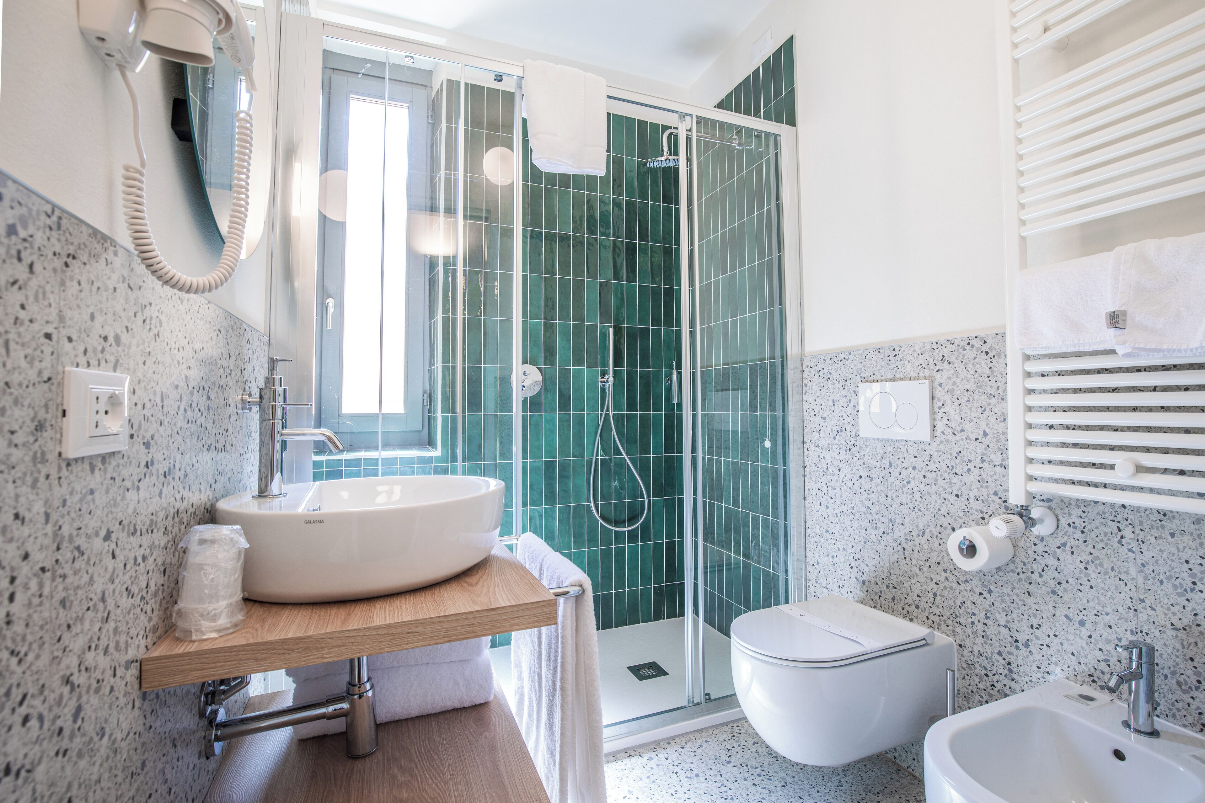 quadruple room | bathroom | hair dryer, towels