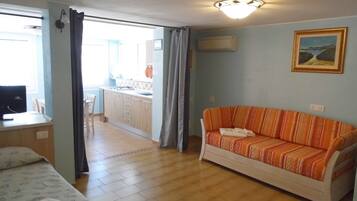 Appart'hôtel Confort, rez-de-chaussée | Salle de séjour