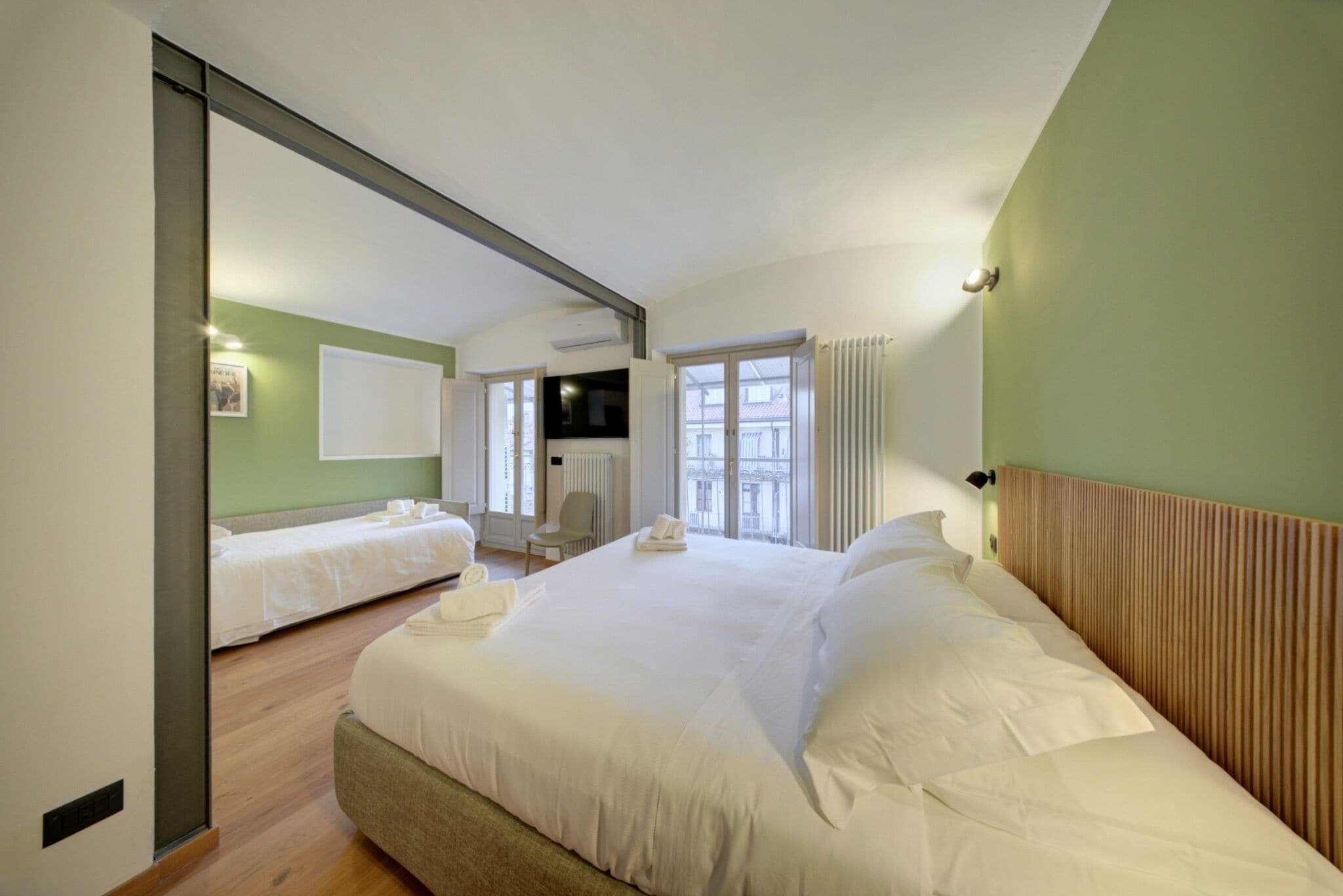 HOME SUITE (Edificio Annesso all Hotel) | Premium bedding, down comforters, pillowtop beds, minibar