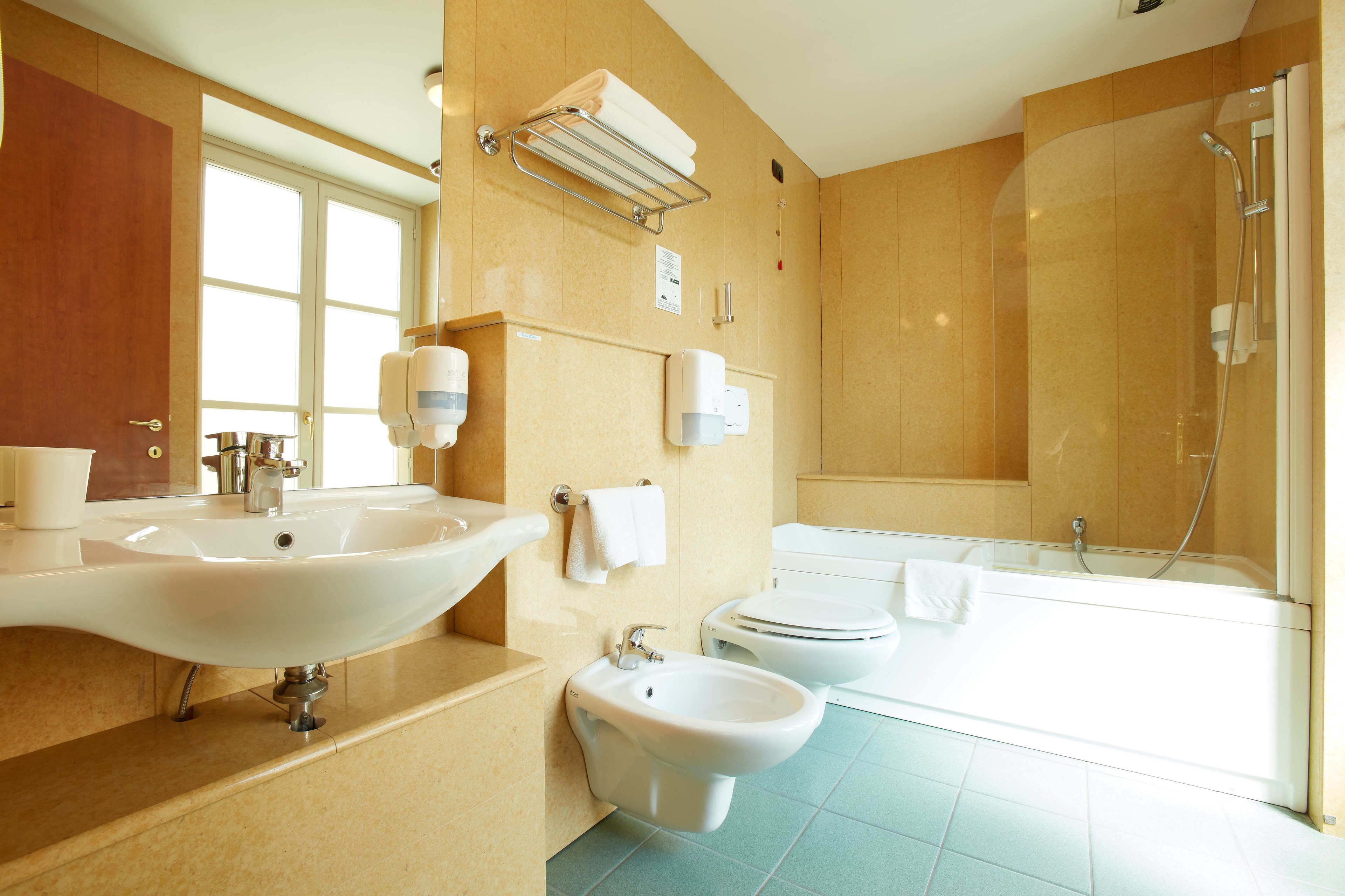 free toiletries, hair dryer, bathrobes, bidet