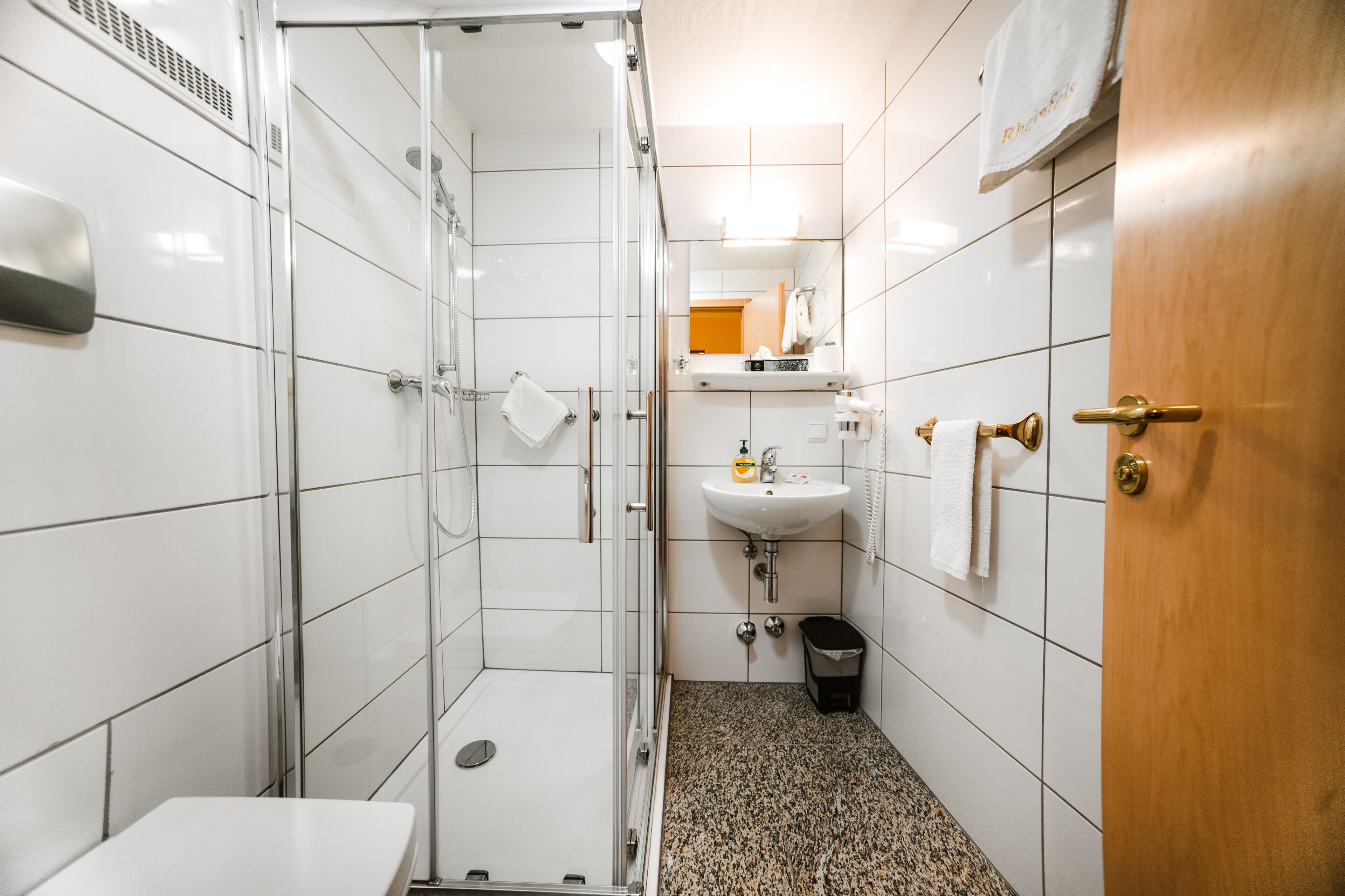single room | bathroom | shower, hair dryer, towels