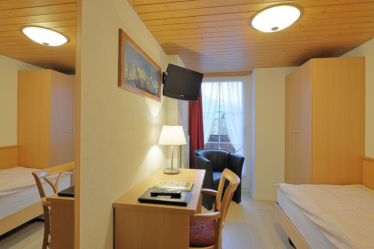 Premium bedding, memory foam beds, in-room safe, desk