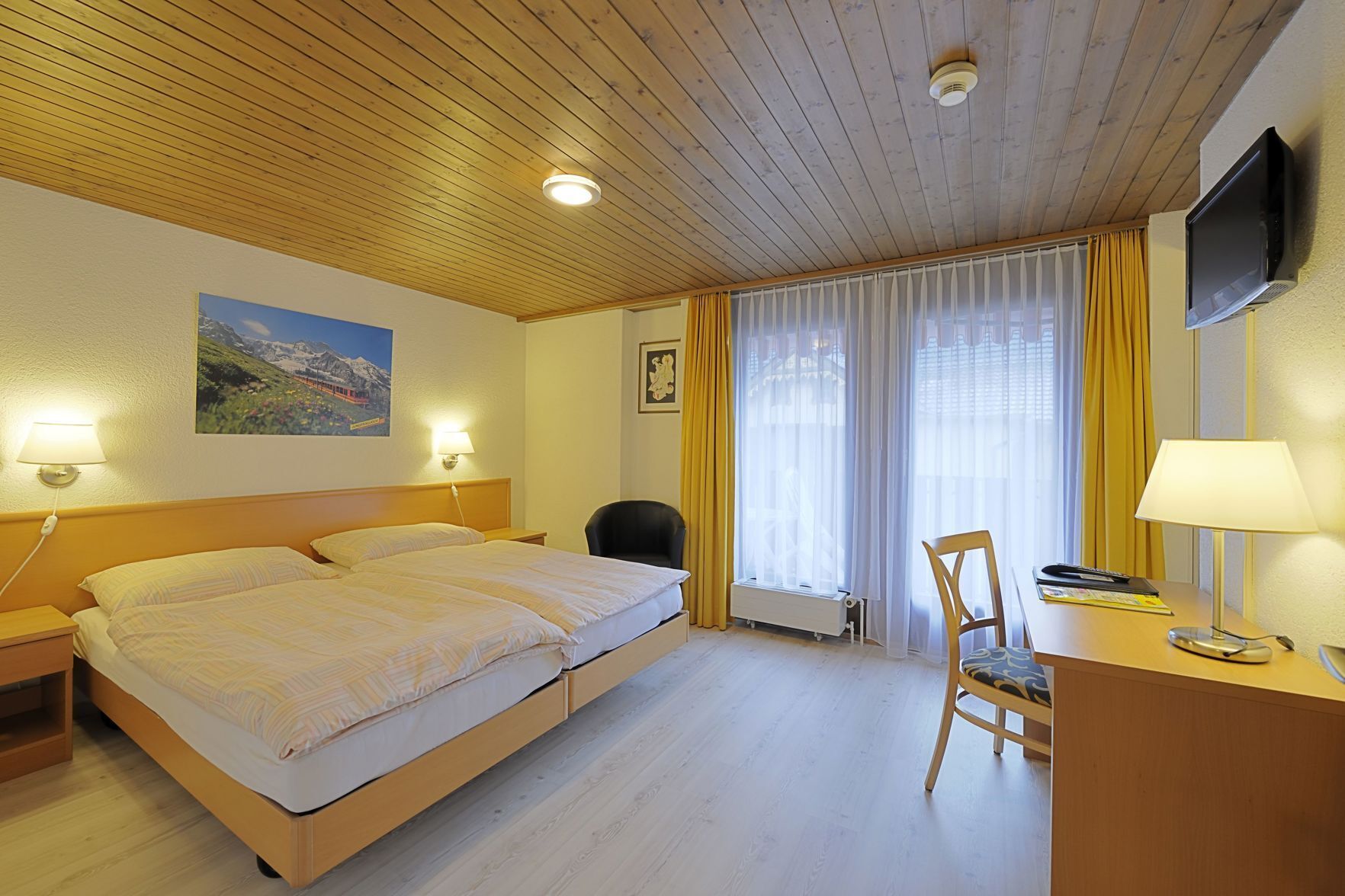 Premium bedding, memory-foam beds, in-room safe, desk