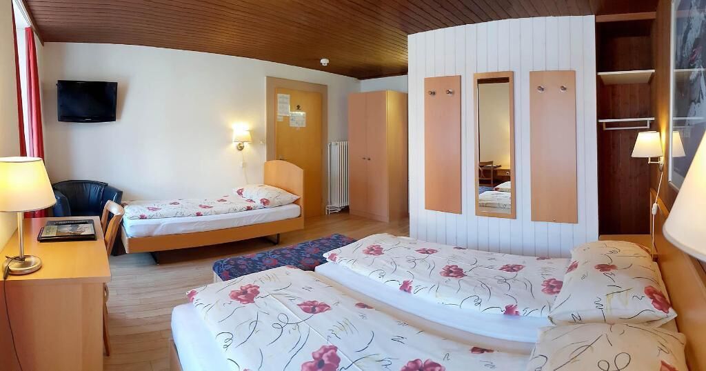 Premium bedding, memory-foam beds, in-room safe, desk