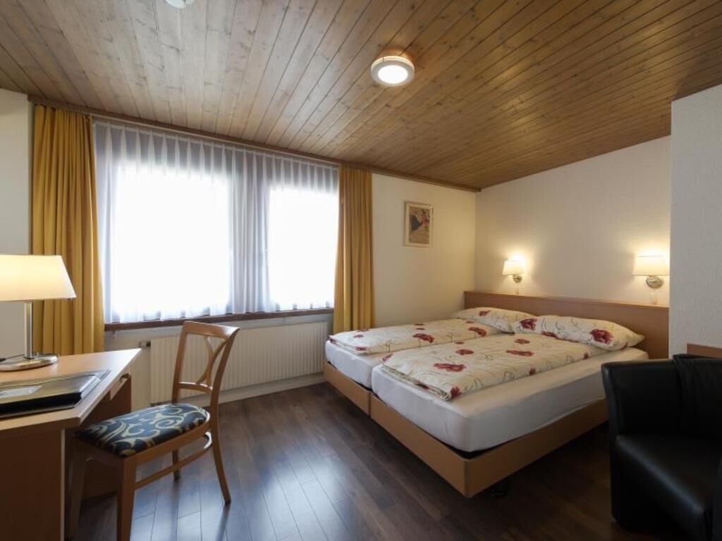 Premium bedding, memory-foam beds, in-room safe, desk