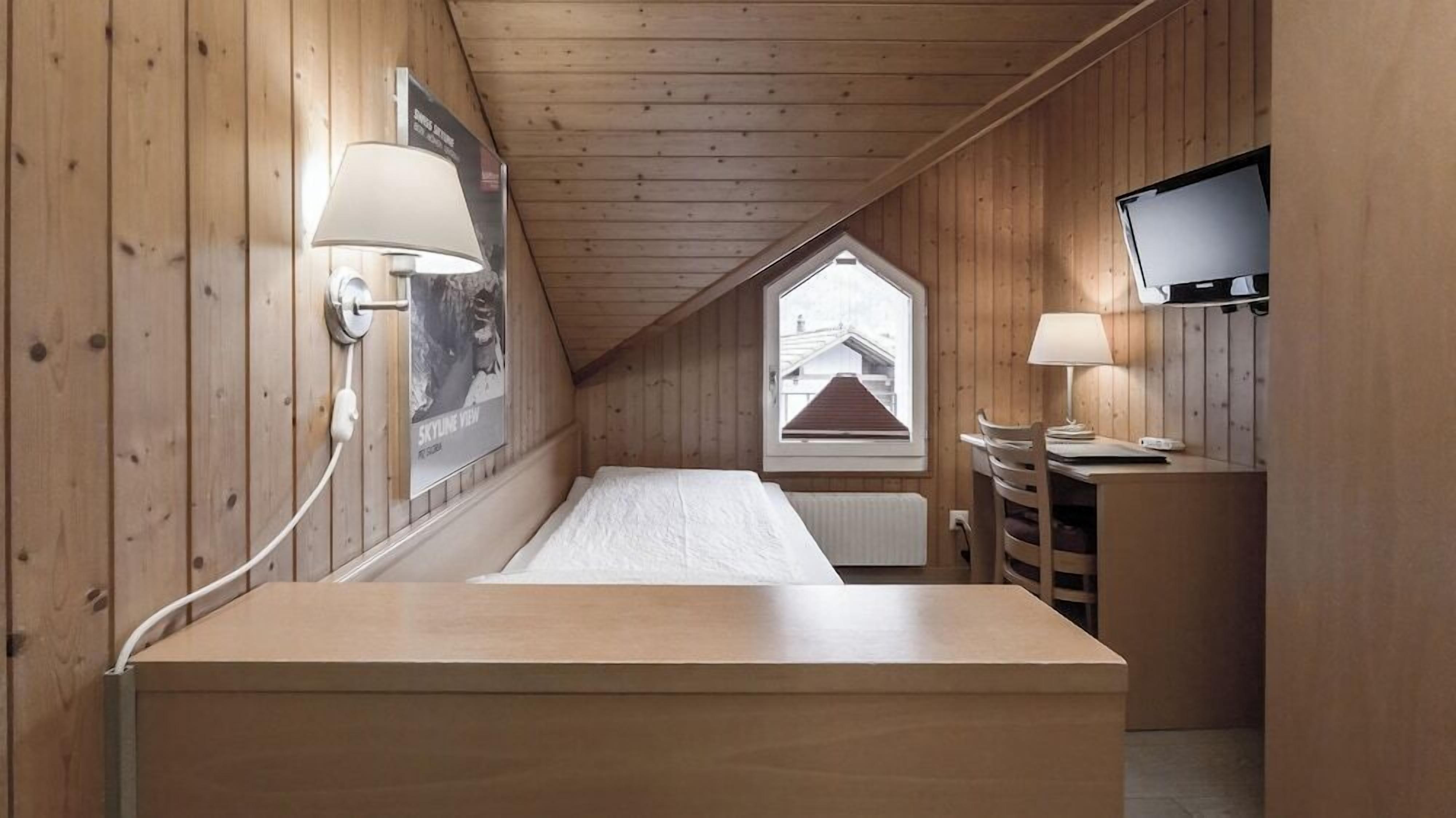 Premium bedding, memory-foam beds, in-room safe, desk