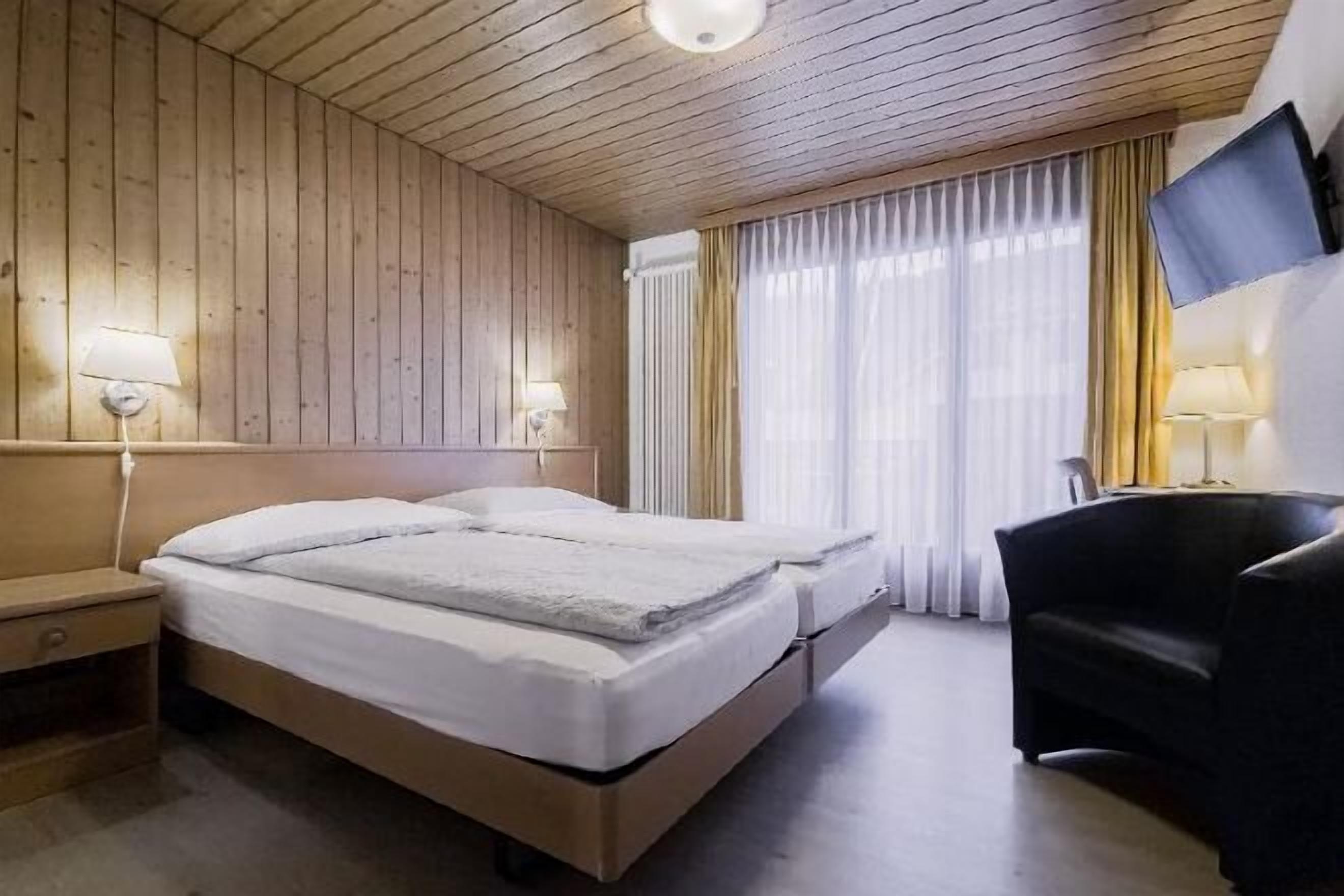 Premium bedding, memory-foam beds, in-room safe, desk