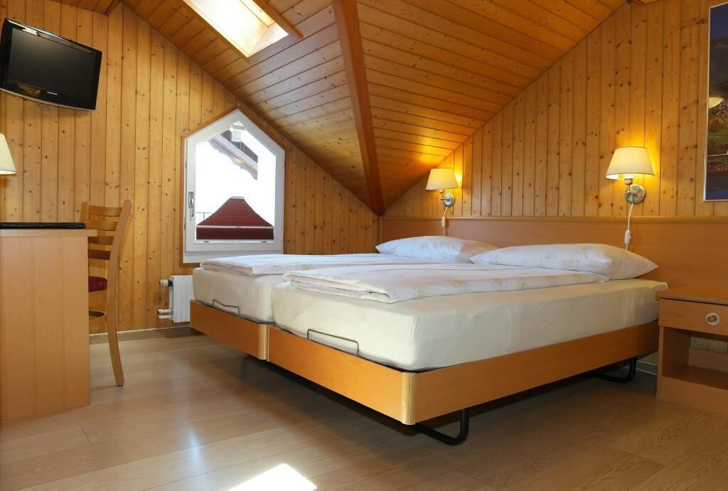 Premium bedding, memory-foam beds, in-room safe, desk