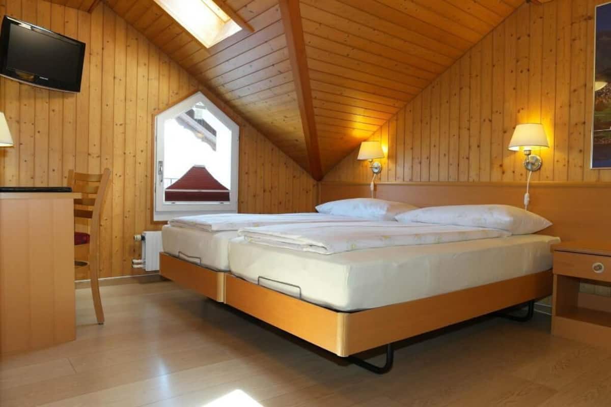 Premium bedding, memory foam beds, in-room safe, desk