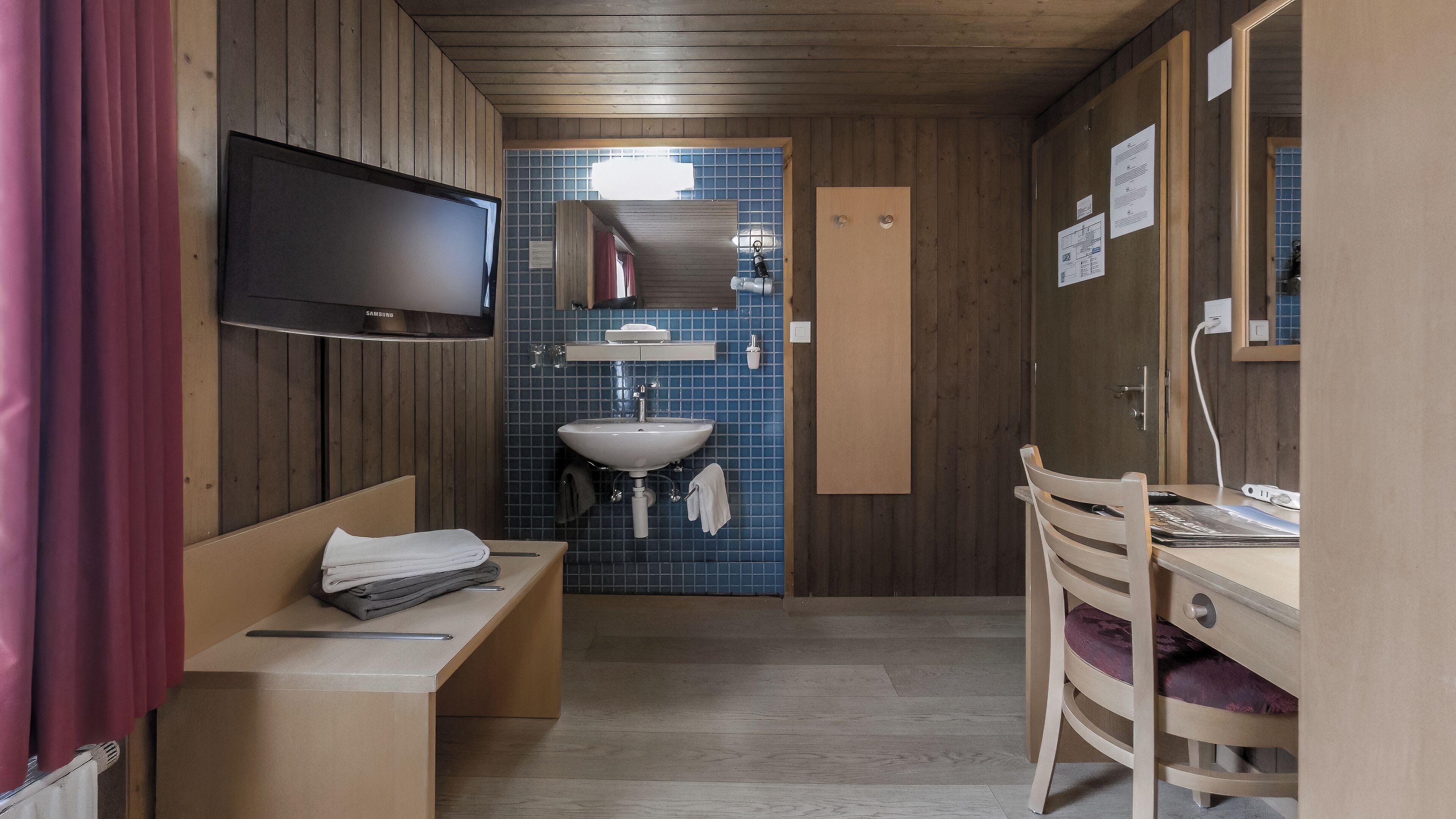 basic twin room, shared bathroom | premium bedding, memory-foam beds, in-room safe, desk