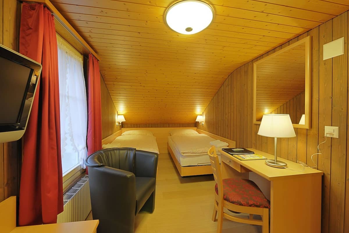 Premium bedding, memory foam beds, in-room safe, desk