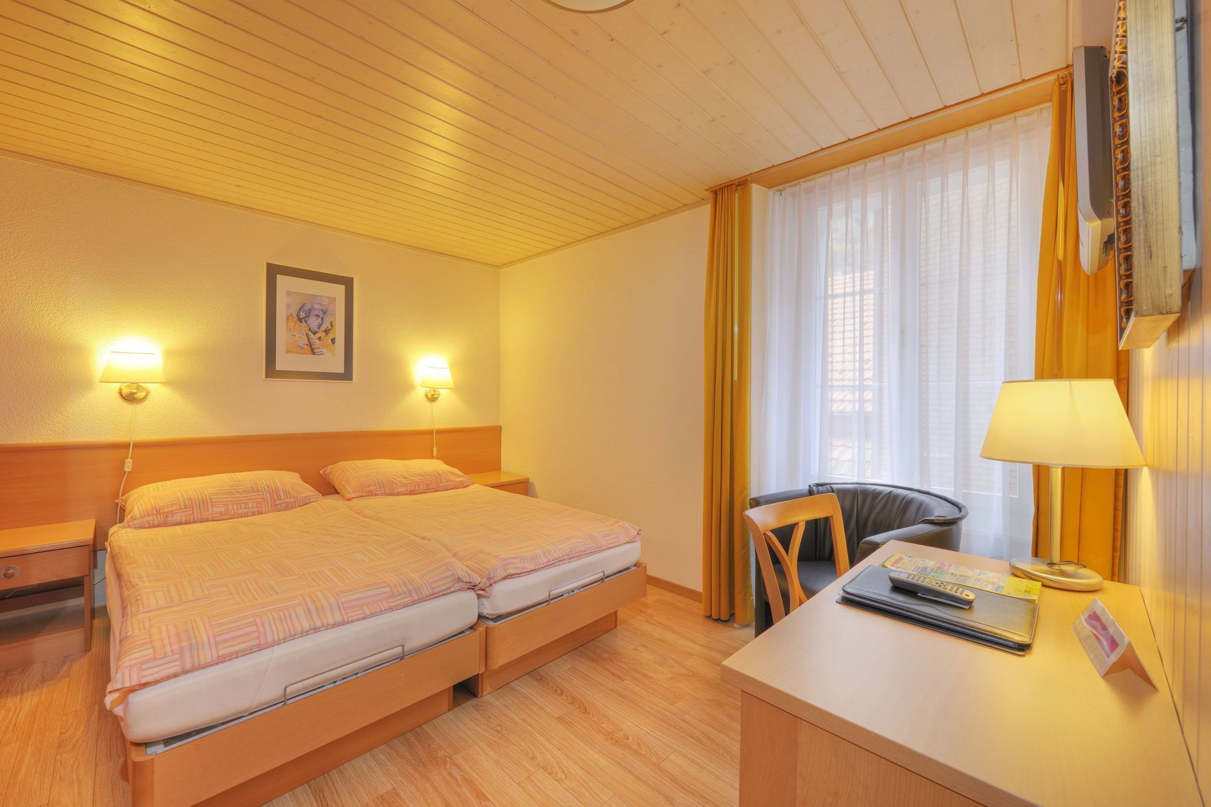 Premium bedding, memory-foam beds, in-room safe, desk