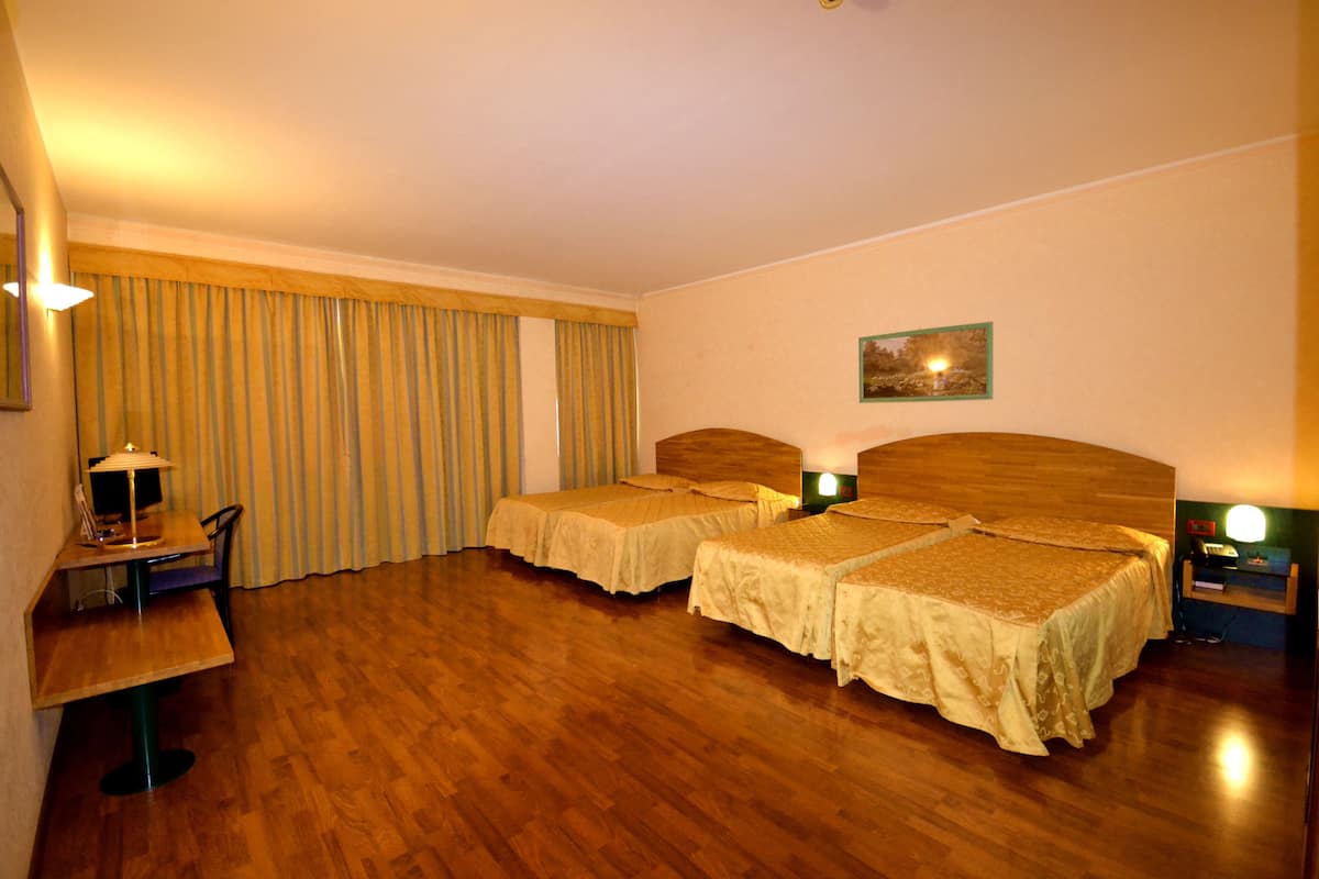 Quadruple Room | Premium bedding, minibar, in-room safe, desk