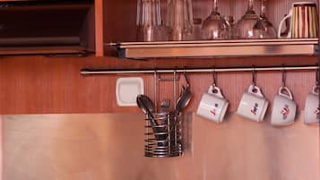 Triple Room, Fireplace | Private kitchenette | Fridge