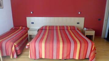 Standard Triple Room | Minibar, in-room safe, desk, free WiFi