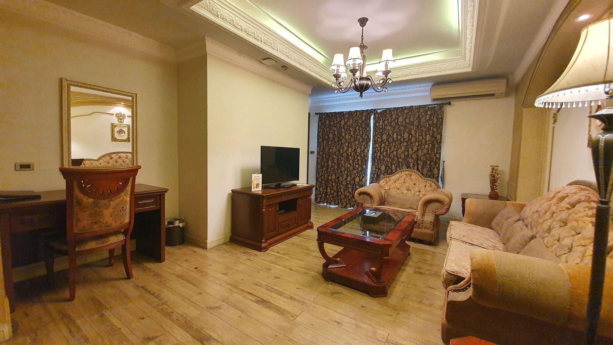 one bedroom suite | living area | 32-inch flat-screen tv with satellite channels, tv, fireplace