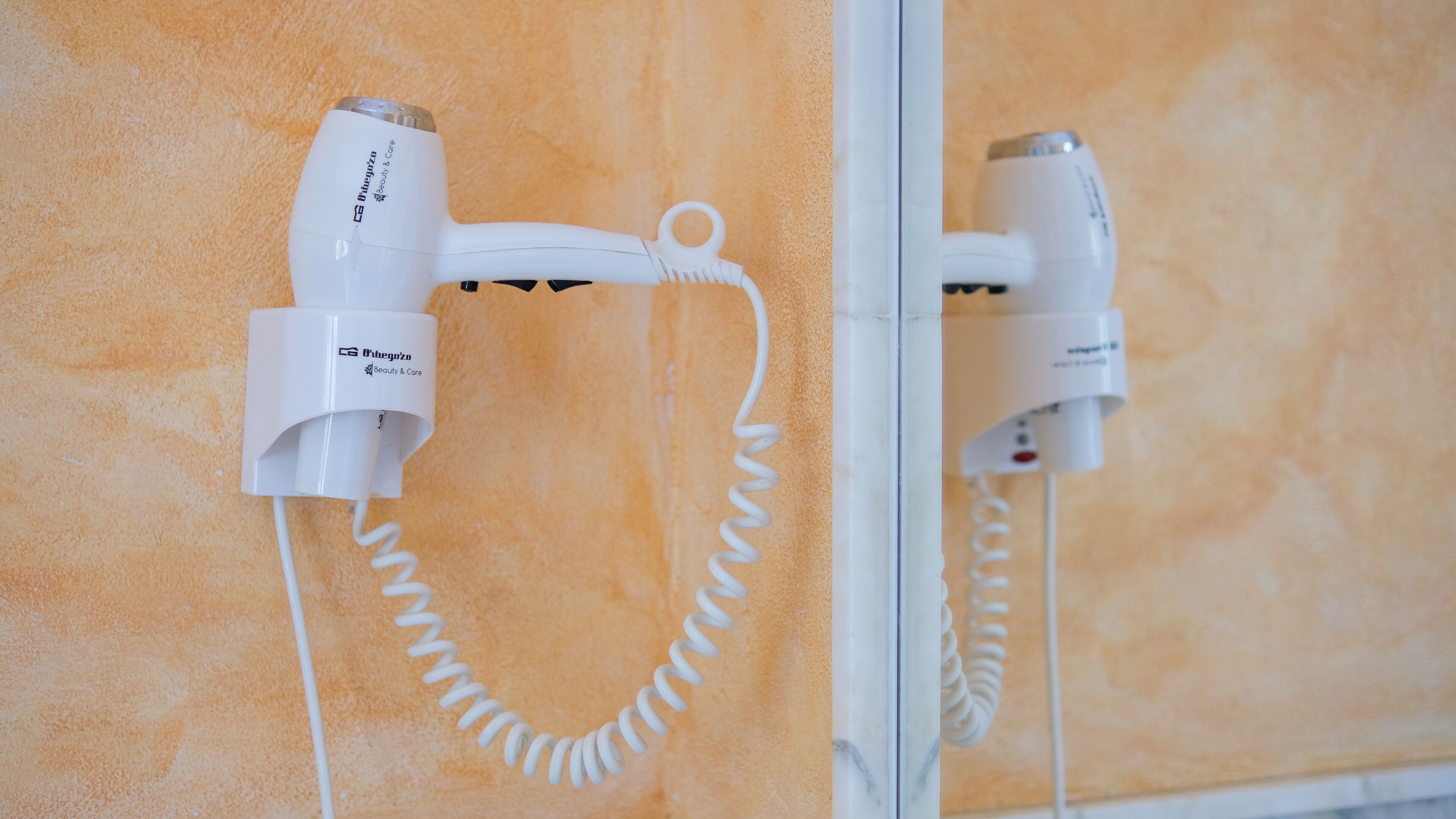 family room | bathroom amenities | hair dryer, towels