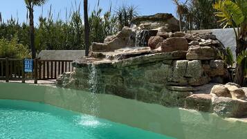 Seasonal outdoor pool, pool umbrellas, sun loungers