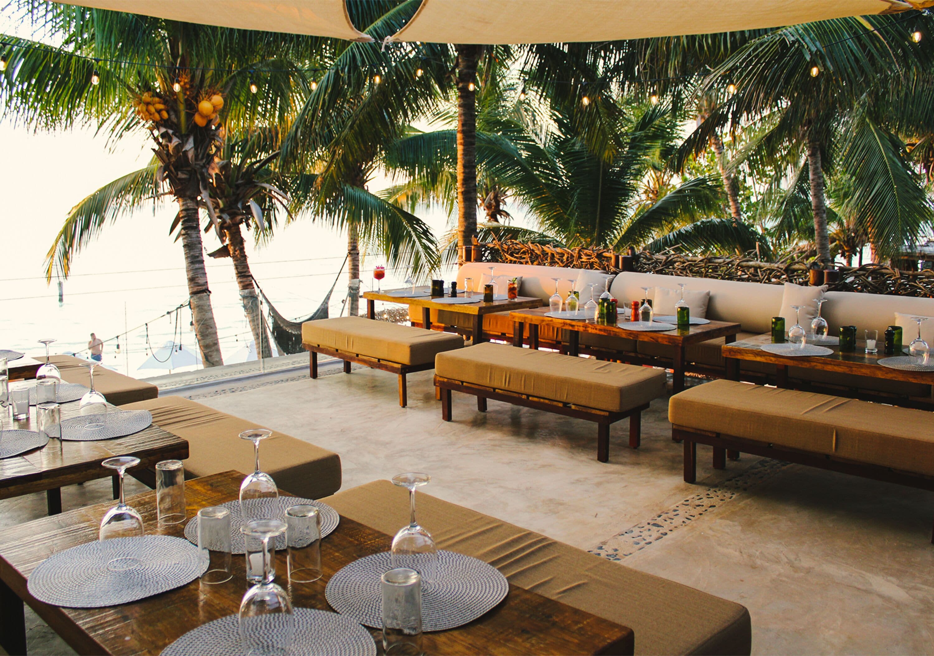 on the beach, white sand, sun-loungers, beach towels