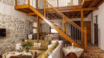 Villa (Pool) | Living area | 82-cm LCD TV with satellite channels, TV, DVD player