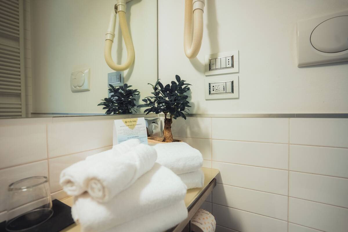 superior triple room, garden view | bathroom | free toiletries, hair dryer, towels