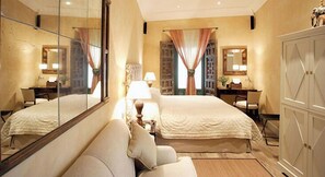 Suite junior | 1 habitación, ropa de cama de alta calidad y edredón 