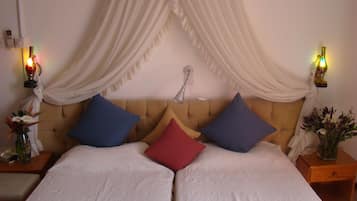 Premium bedding, down comforters, in-room safe, individually decorated