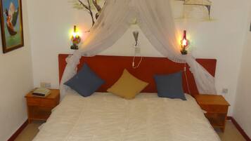 Luxe beddengoed, donzen dekbedden, een kluis op de kamer