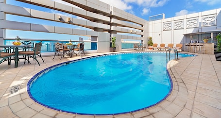 Outdoor pool, open 9:00 AM to 6:00 PM, sun loungers