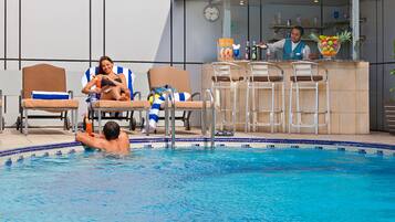 Outdoor pool, open 9:00 AM to 6:00 PM, pool loungers