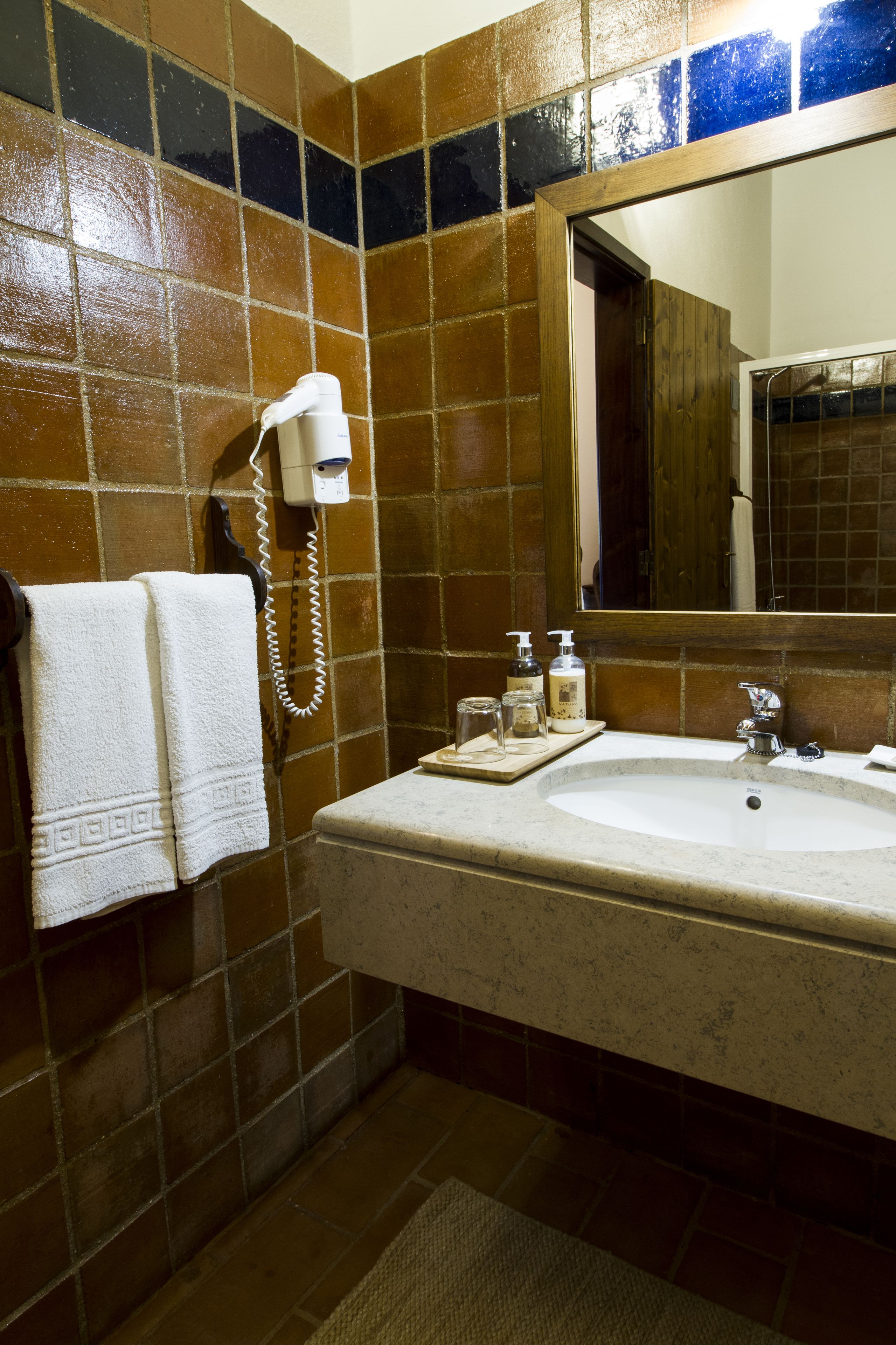 free toiletries, hair dryer, bidet, towels