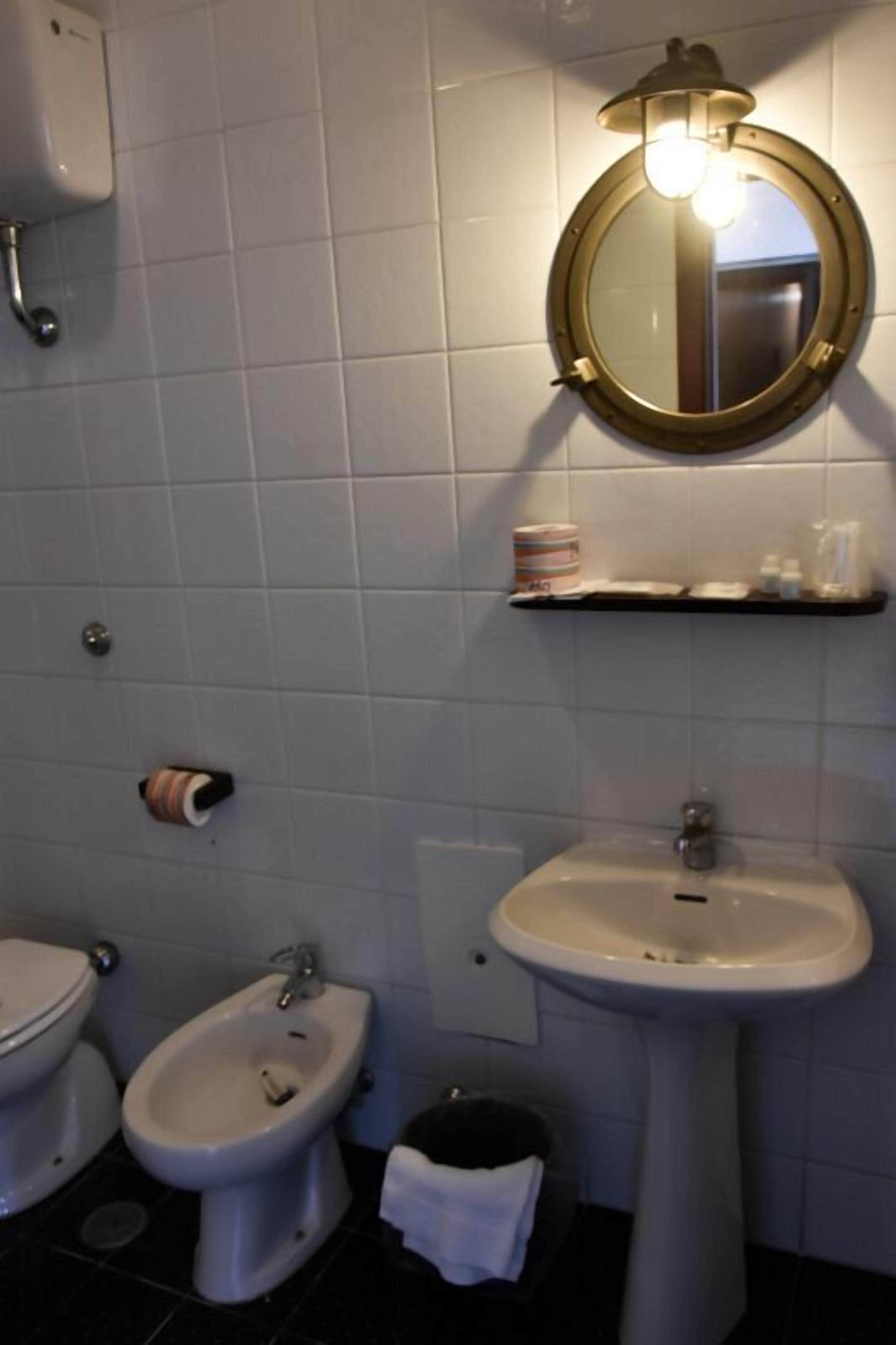 shower, free toiletries, hair dryer, slippers