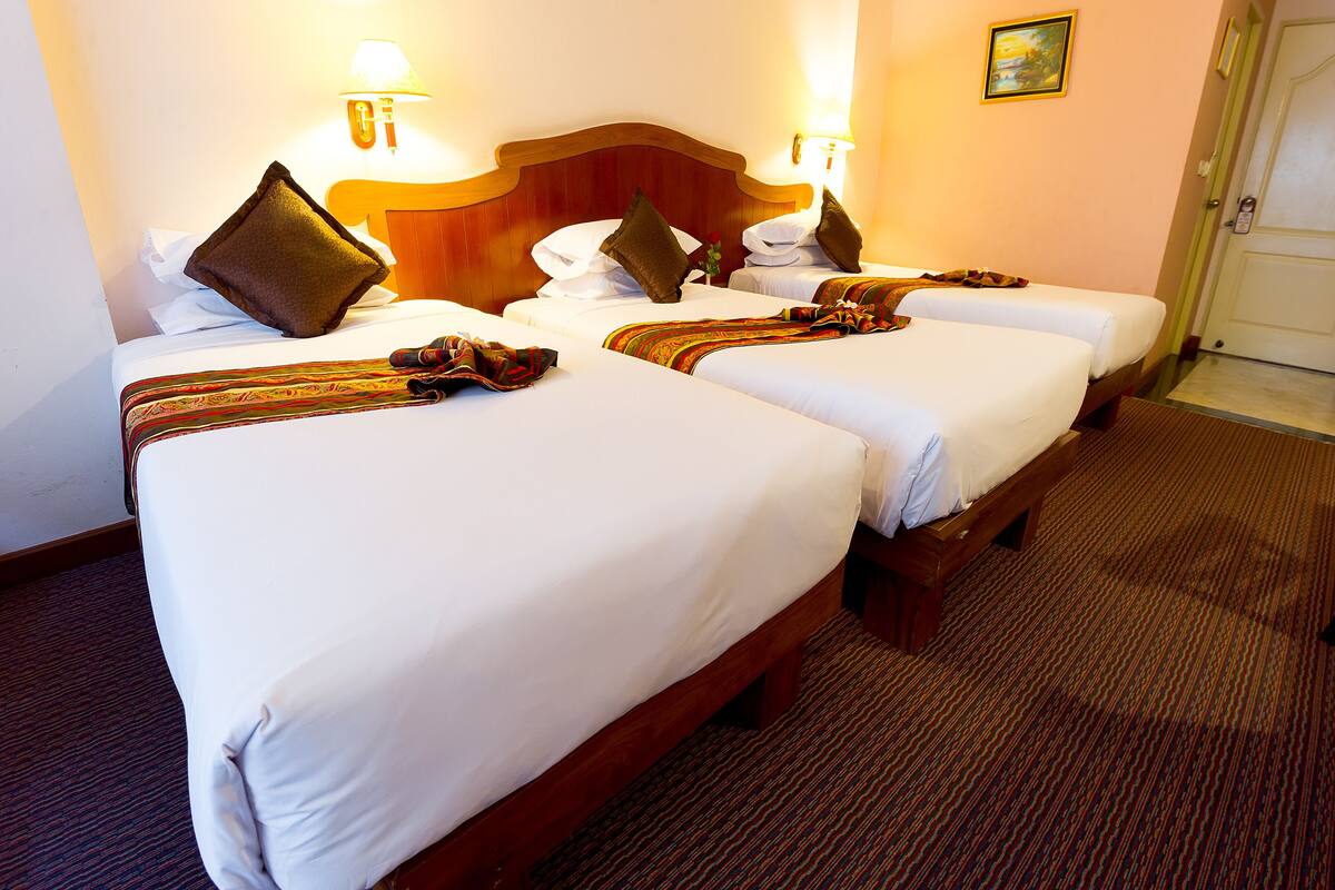 Deluxe Family Triple Room | Minibar, brankas, meja kerja, dan Wi-Fi gratis