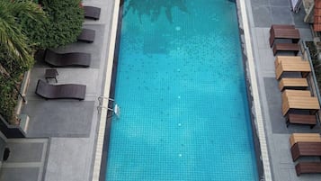 Outdoor pool, pool umbrellas, sun loungers