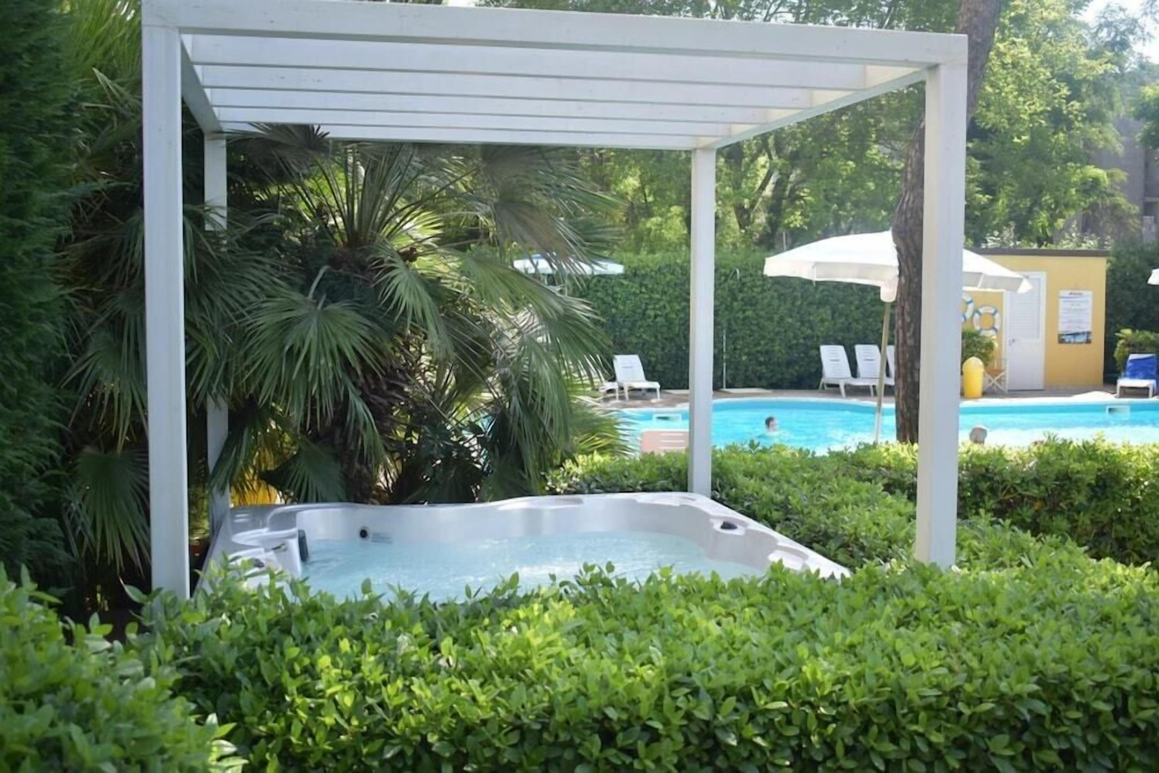 Outdoor pool, pool umbrellas, pool loungers