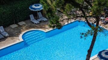 Outdoor pool, pool umbrellas, pool loungers
