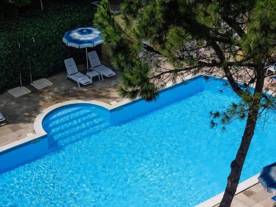 Outdoor pool, pool umbrellas, sun loungers