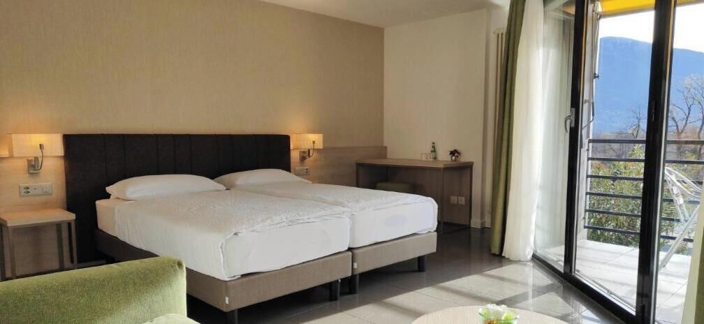 Superior Double Room, Balcony, Garden View | Minibar, in-room safe, rollaway beds, free WiFi