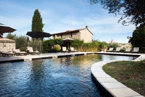 Seasonal outdoor pool, pool umbrellas, pool loungers